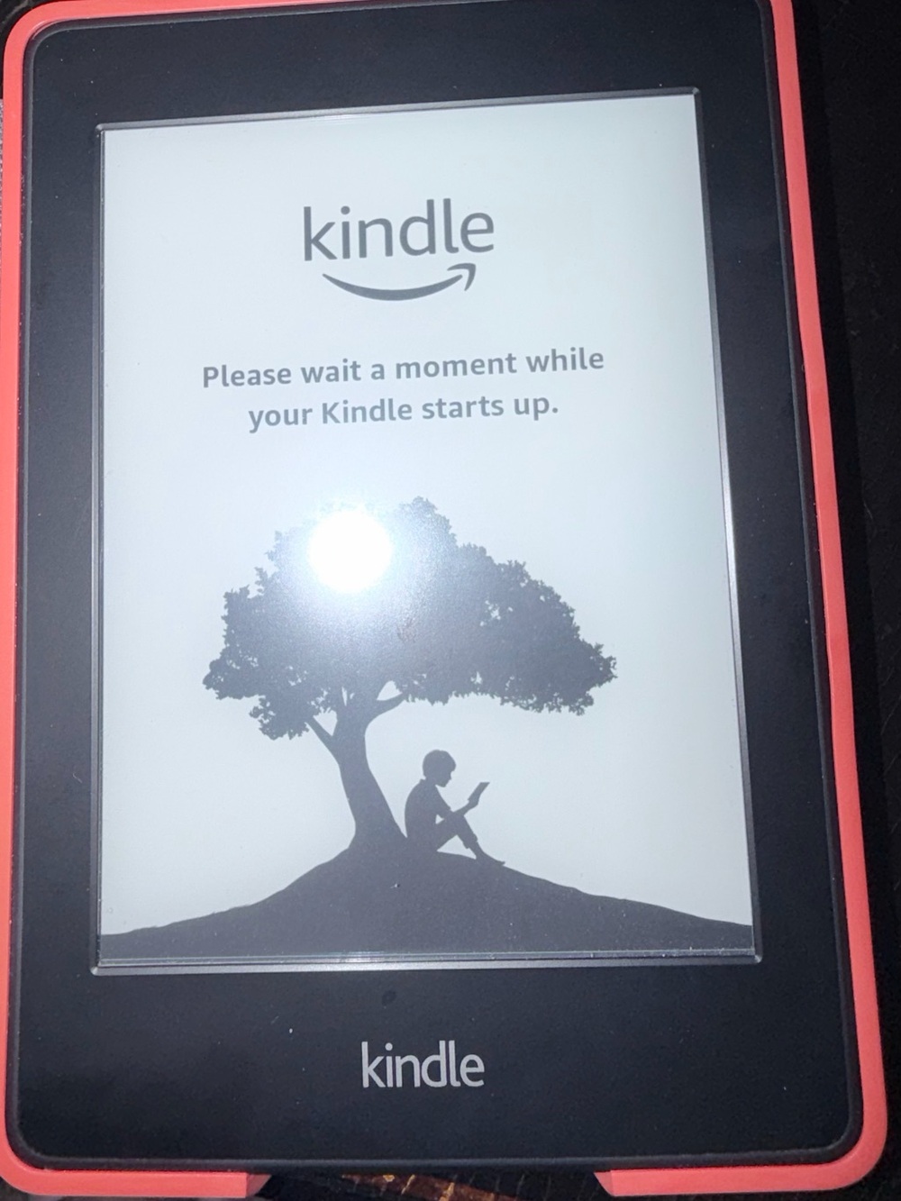 Amazon Kindle e-Reader with Coral Orange  Frame
